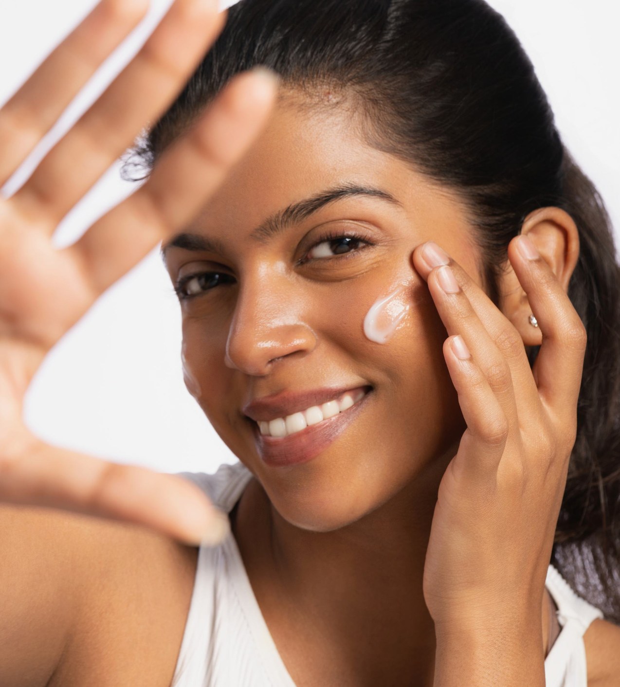 Applying Hydrating Barrier Cream to the cheek